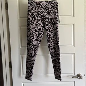 NWT Onzie brand leggings. Black and pale pink color.